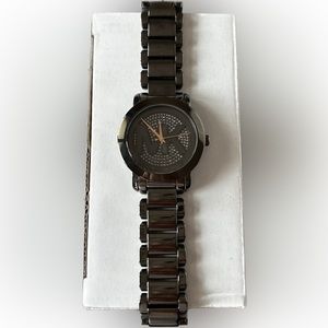 Women’s Michael Kors new battery